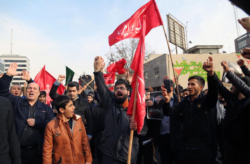 People gather to protest against Soleimani's assassination after Friday prayers in Tehran. (Photo: Anadolu Agency via Getty Images)