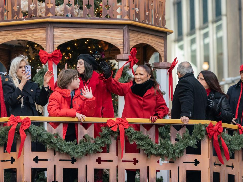 Gloria Estefan rides on a float.