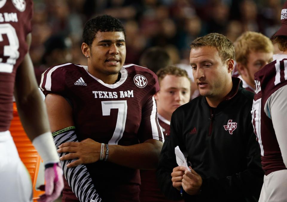 Kenny Hill (7), now at TCU, was coached by Jake Spavital at Texas A&M. (Getty)