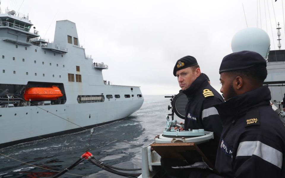 HMS Sutherland and RFA Tidespring conducting a Replenishment At Sea, known as a RAS.  - HMS Sutherland