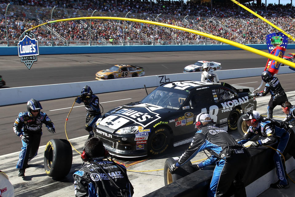 AVONDALE, AZ - MARCH 04: Jimmie Johnson, driver of the #48 Lowe's/ Kobalt Tools Chevrolet, pits during the NASCAR Sprint Cup Series SUBWAY Fresh Fit 500 at Phoenix International Raceway on March 4, 2012 in Avondale, Arizona. (Photo by Christian Petersen/Getty Images)