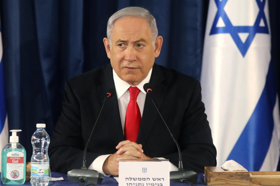 Israeli Prime Minister Benjamin Netanyahu chairs the weekly cabinet meeting in Jerusalem, Sunday, June 7, 2020. (Menahem Kahana/Pool Photo via AP)