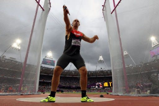 Germany's Robert Harting competes to win the men's discus throw final at the athletics event during the London 2012 Olympic Games in London