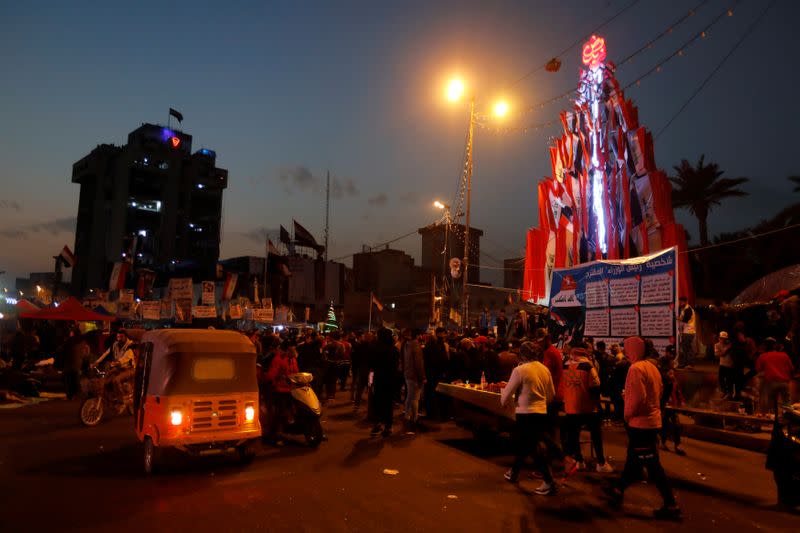 Iraqi demonstrators gather at Tahrir Square during ongoing anti-government protests in Baghdad