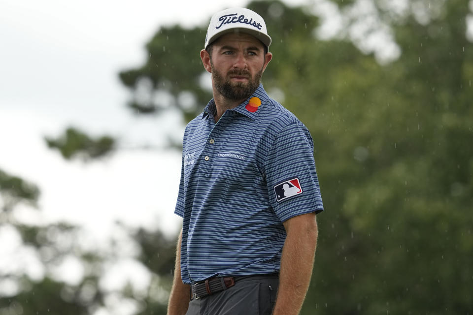 Cameron Young watches play on the third hole during the first round of the Tour Championship golf tournament at East Lake Golf Club, Thursday, Aug. 25, 2022, in Atlanta. (AP Photo/Steve Helber)