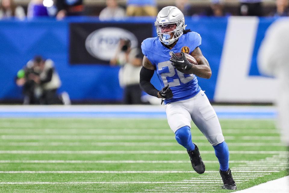 Detroit Lions running back Jahmyr Gibbs runs against the Green Bay Packers during the second half at Ford Field in Detroit on Thursday, Nov. 23, 2023.