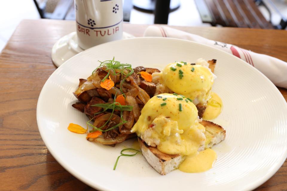 Bar Tulia Mercato's crostini lobster Benedict is a special.