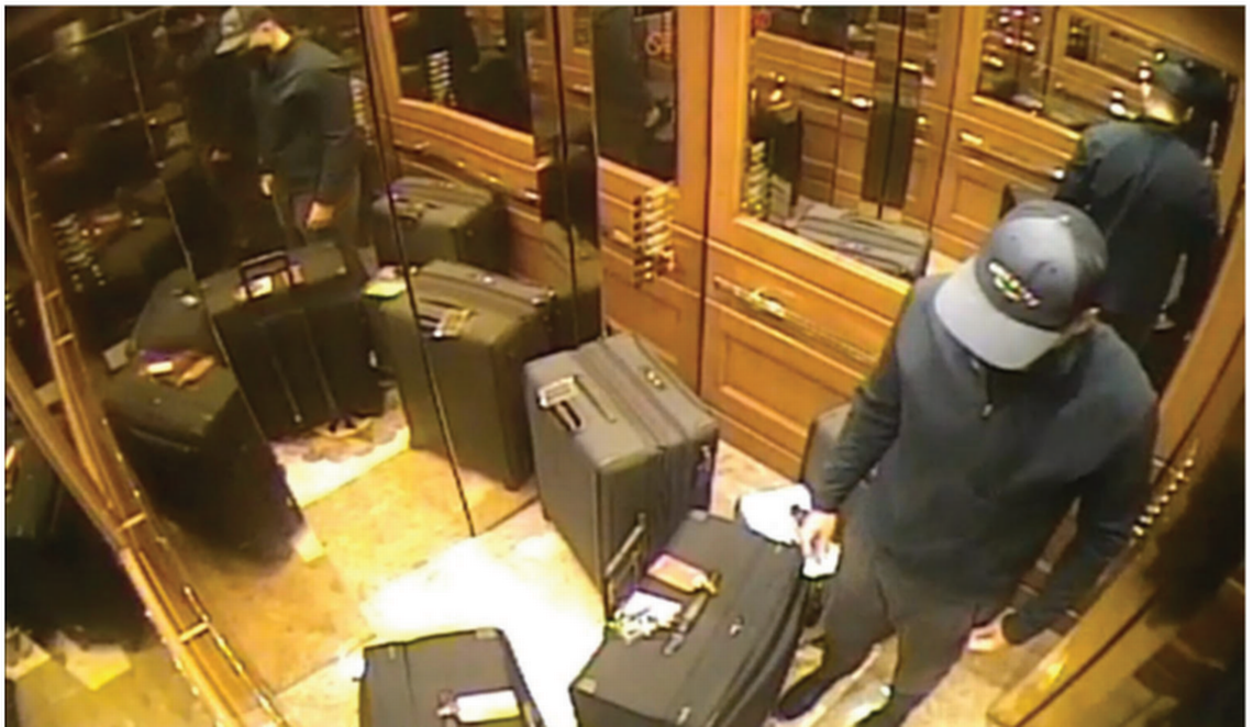 Jobson De Castro with six suitcases of stolen goods in an elevator at The Peninsula Beverly Hills.