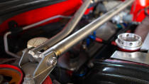 <p>Strut tower bars are more than just an aesthetic upgrade. These bars control chassis flex to improve your car’s handling and prevent fatigue cracking of the strut. You can buy a strut tower bar for around $80, and they are fairly simple to install yourself with just a socket wrench.</p>