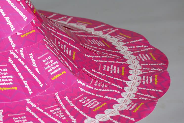 A dress made from Planned Parenthood signs and stickers. (Photo: Erica Lansner)