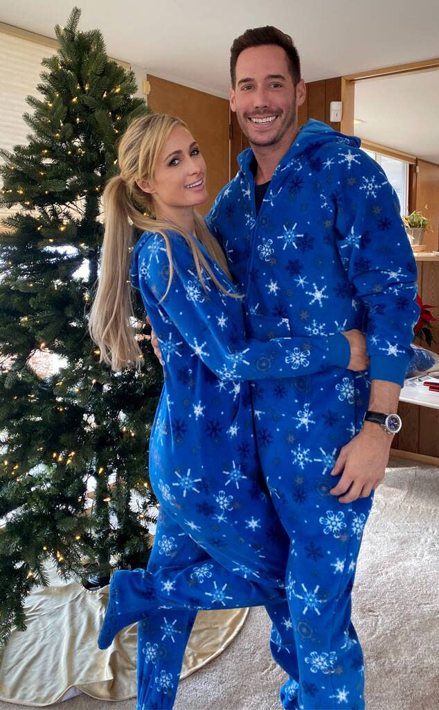 Paris Hilton and fiancé Carter Reum wear matching tracksuits