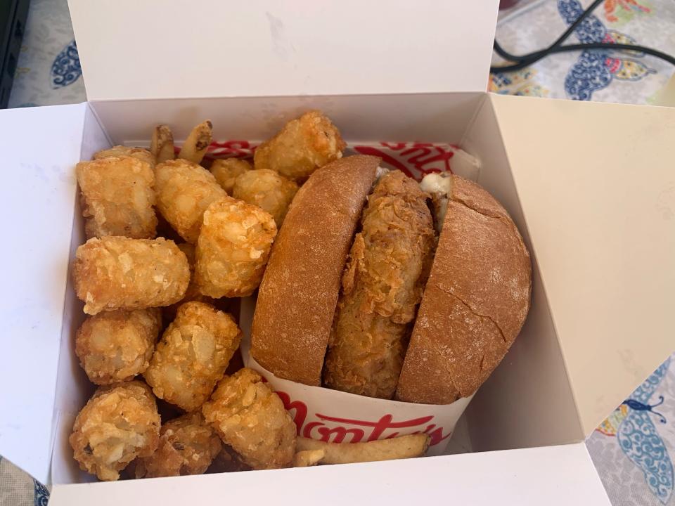 A chicken sandwich and tater tots from Monty's Good Burger at the Stagecoach country music festival in Indio, Calif., on May 1, 2022.