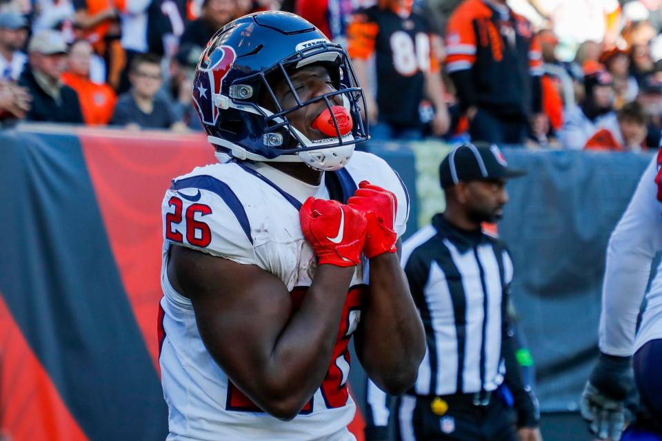 Nov 12, 2023; Cincinnati, Ohio, USA; Houston Texans running back Devin Singletary (26) reacts after scoring a touchdown against the Cincinnati Bengals in the second half at Paycor Stadium. Mandatory Credit: Katie Stratman-USA TODAY Sports