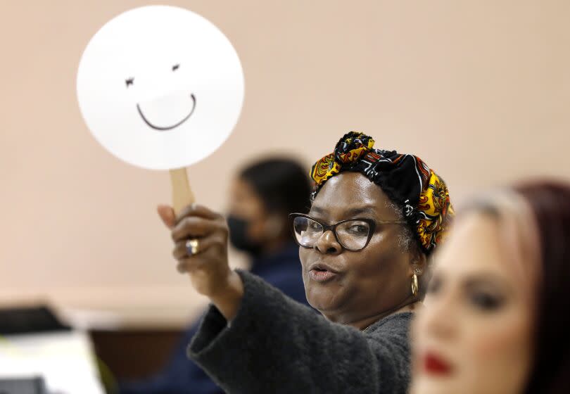 WILMINGTON-CA - NOVEMBER 8, 2022: Poll worker Carletta Williams welcomes voters at Veterans of Foreign Wars Post 2967 in Wilmington on Tuesday, November 8, 2022. (Christina House / Los Angeles Times)