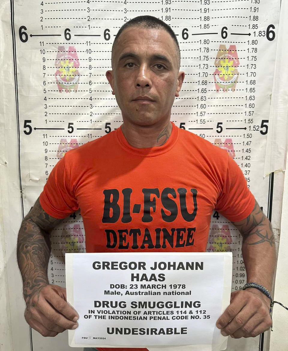 In this handout photo provided by the Philippine Bureau of Immigration, Australian national Gregor Johann Haas poses for a mugshot following his arrest in Cebu province, Central Philippines on Wednesday, May 15, 2024. One of Indonesia's most-wanted drug suspects has been arrested in the Philippines after an international manhunt and efforts were underway to have the suspect, reportedly the father of an Australian rugby star, extradited to Jakarta to face charges, Indonesian and Philippine officials said Friday. (Philippine Bureau of Immigration via AP)