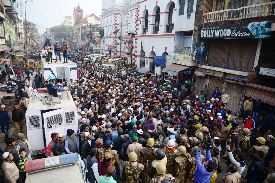 Protesters gather outside the Jama Masjid mosque during demonstrations against India's new citizenship law in Allahabad on December 20, 2019. - Fresh clashes between Indian police and demonstrators erupted on December 20 after more than a week of deadly unrest triggered by a citizenship law seen as anti-Muslim. (Photo by SANJAY KANOJIA / AFP) (Photo by SANJAY KANOJIA/AFP via Getty Images)