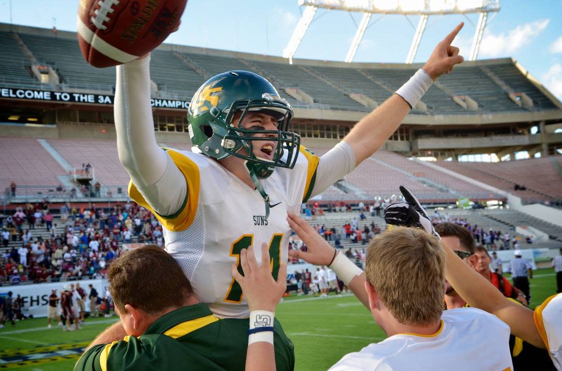 ORLANDO, FL - DECEMBER 8: QB, Mike White of University School celebrates the schools defeat of Madison County for the Class 3A state championship, Saturday, December 8, 2012 in Orlando, Florida. (Photo by RobertoGonzalezPhoto.com)