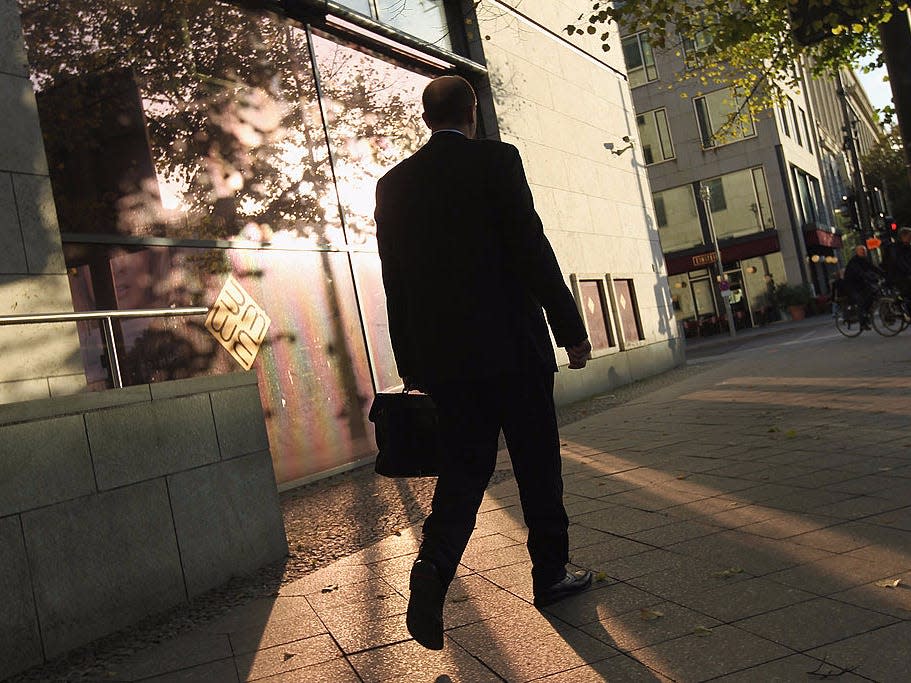 Man walks with briefcase