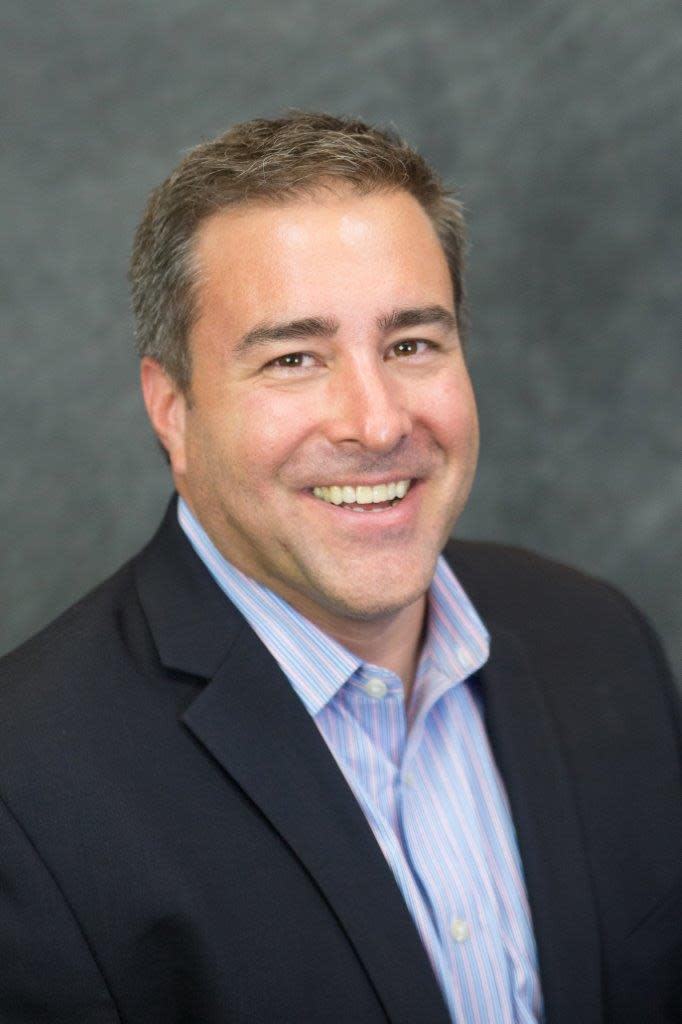 Smiling headshot of Michael O’Halloran.