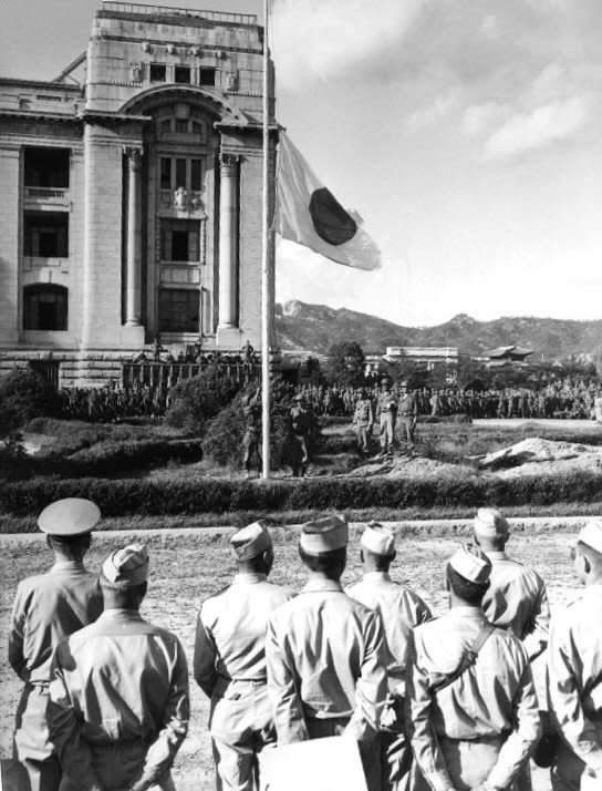 Japanese forces surrender to U.S. troops in Seoul on September 9, 1945, one day after U.S. forces arrived in southern Korea. File Photo courtesy of the U.S. Navy