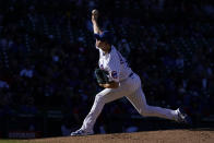 Chicago Cubs starting pitcher Keegan Thompson delivers in the late afternoon sun during the eighth inning of a baseball game against the Philadelphia Phillies, Thursday, Sept. 29, 2022, in Chicago. (AP Photo/Charles Rex Arbogast)