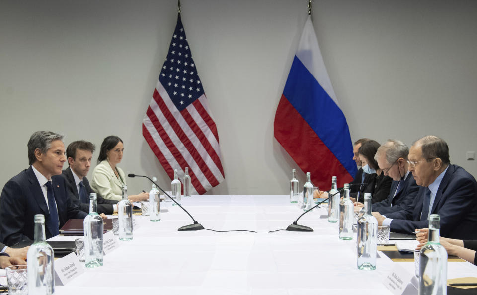 U.S. Secretary of State Antony Blinken, left, meets with Russian Foreign Minister Sergey Lavrov, right, at the Harpa Concert Hall in Reykjavik, Iceland, Wednesday, May 19, 2021, on the sidelines of the Arctic Council Ministerial summit. (Saul Loeb/Pool Photo via AP)