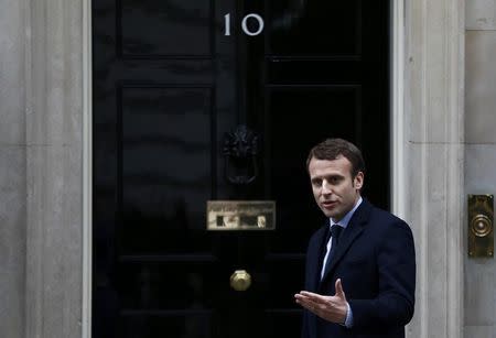 Emmanuel Macron, candidate in France's 2017 French presidential arrives at 10 Downing Street in central London, Britain, February 21, 2017. REUTERS/Stefan Wermuth