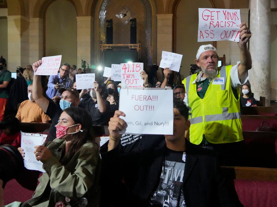 Protestors disrupt the start of a Los Angeles City Council meeting on Oct. 12, 2022 in Los Angeles. Los Angeles City Council President Nury Martinez announced Tuesday she is taking a "leave of absence" from the council two days after audio leaked of her racist remarks in a meeting last October, the Los Angeles Times reported. President Joe Biden wants to see resignations from all three members of the Los Angeles City Council who took part in the conversation.