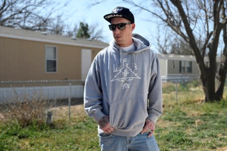 Randy McClain stands outside of his home in Midland, Texas
