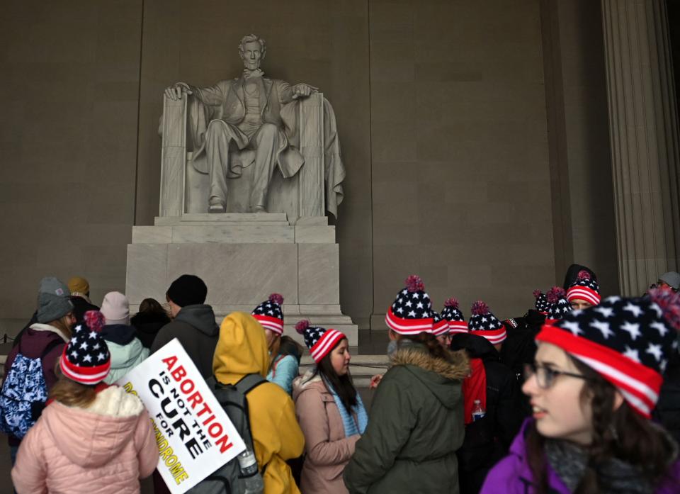 Pro-life activists visit the Lincoln Memorial before the 49th annual March for Life, on January 21, 2022, in Washington, D.C.