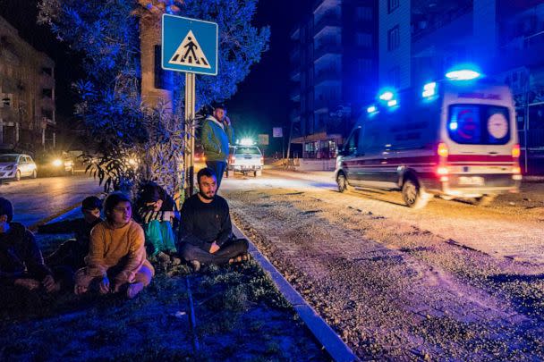 PHOTO: Civilians wait in the middle of the streets after a fast evacuation of their homes because a 6,4 magnitude earthquake in Reyhanli, Hatay, near the border with Syria in Turkey, Feb. 20, 2023. (Celestino Arce Lavin/ZUMAPRESS)