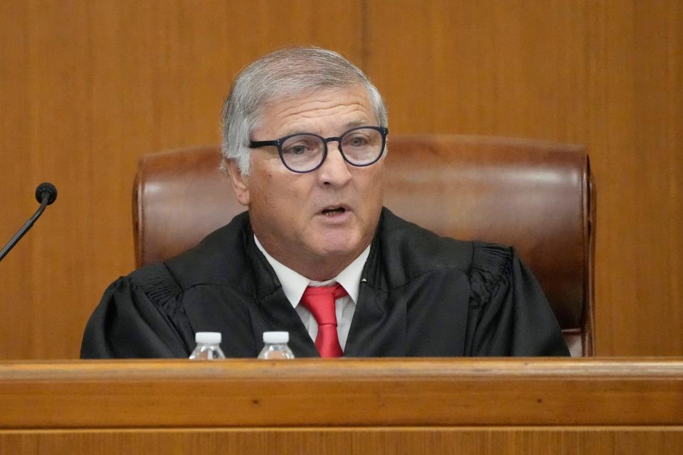 Hinds County Chancery Judge Dewayne Thomas speaks to the parties involved at a hearing, Wednesday, May 10, 2023, in Hinds County Chancery Court in Jackson, Miss., where he heard arguments about a Mississippi law that would create a court system with judges who would be appointed rather than elected. (AP Photo/Rogelio V. Solis)