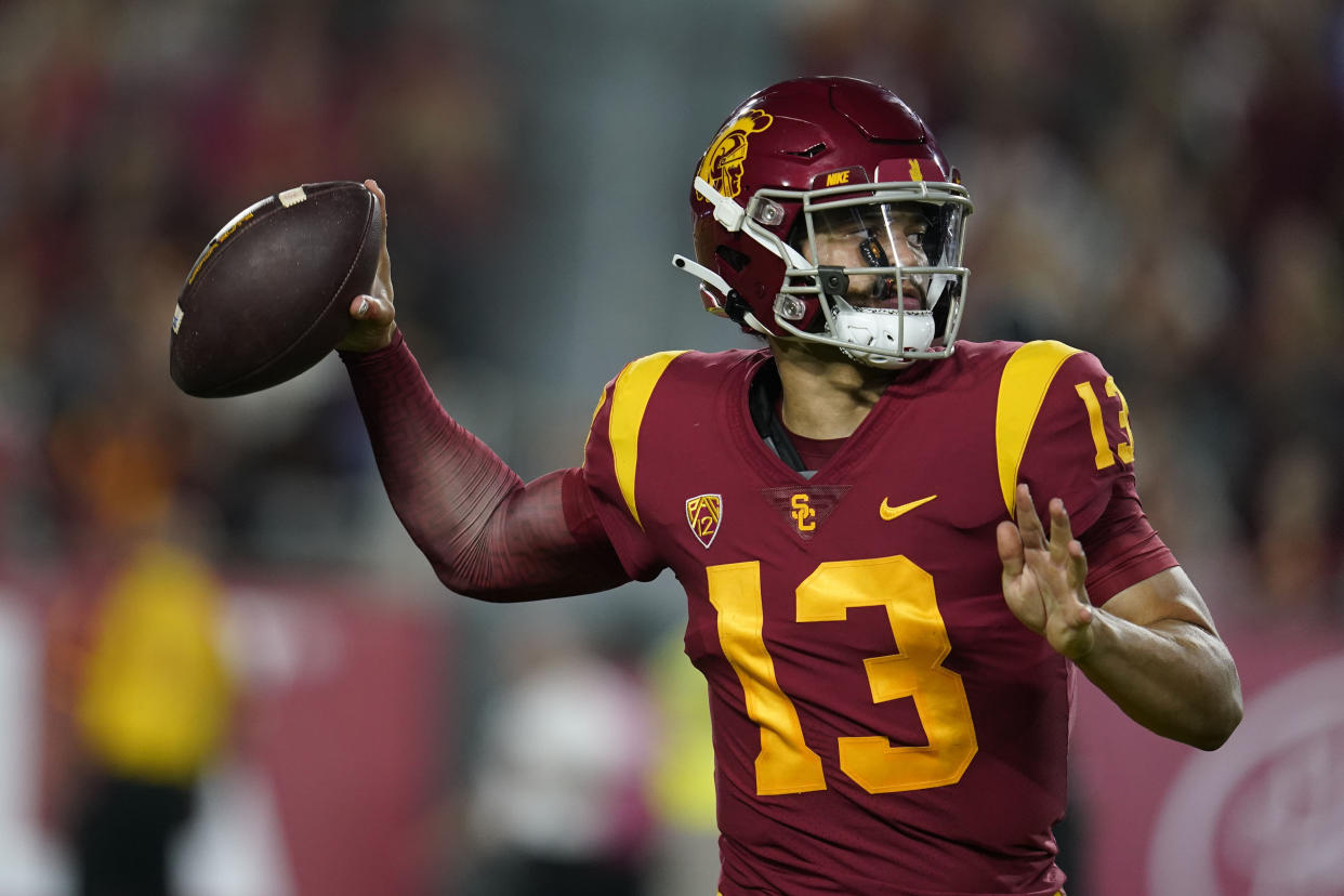 USC quarterback Caleb Williams brings a high-powered offense and a 6-0 record so Salt Lake City this weekend to face Utah. (AP Photo/Marcio Jose Sanchez)