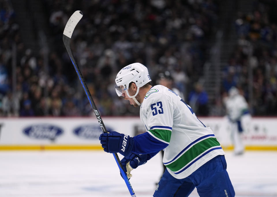 Vancouver Canucks center Bo Horvat (53) celebrates a goal against the Colorado Avalanche during the second period of an NHL hockey game Wednesday, Nov. 23, 2022, in Denver. (AP Photo/Jack Dempsey)