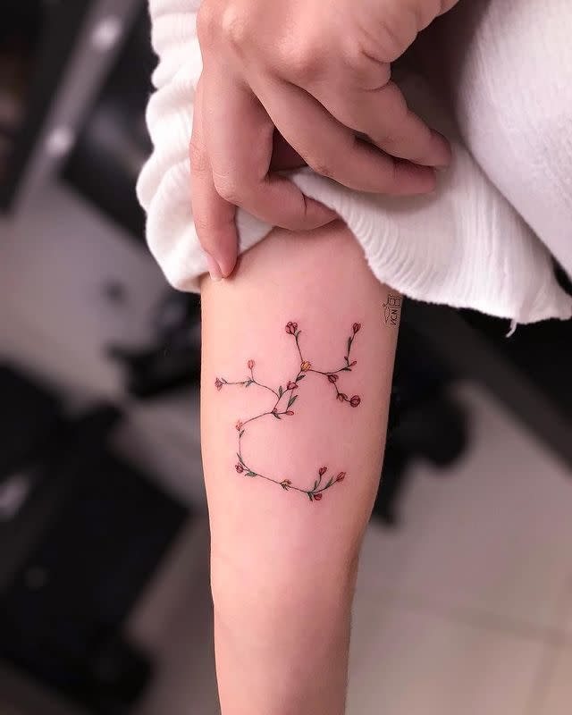 11) This Floral Sagittarius Constellation Tattoo