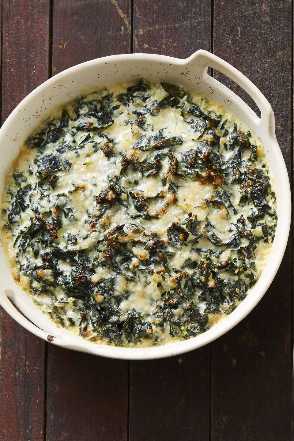 <p>Eat your greens! The ultimate gooey gratin is made with kale instead of spinach.</p><p><em><a href="https://www.goodhousekeeping.com/food-recipes/a46621/creamed-kale-and-gruyere-gratin-recipe/" rel="nofollow noopener" target="_blank" data-ylk="slk:Get the recipe for Creamed Kale and Gruyere Gratin »;elm:context_link;itc:0;sec:content-canvas" class="link ">Get the recipe for Creamed Kale and Gruyere Gratin » </a></em></p>