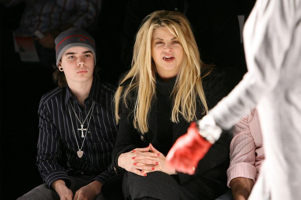 LOS ANGELES, CA - MARCH 09: Actress Kirstie Alley and son William True (left) front row at Whitley Kros Fall 2008 collection during Mercedes Benz LA Fashion Week held at Smashbox Studios on March 9, 2008 in Culver City, California. (Photo by Michael Tran/FilmMagic)