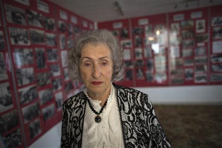 Jewish Holocaust survivor Irena Wodzislawski stands in a museum commemorating the six million victims of the Nazi genocide, inside her home in the West Bank Jewish settlement of Ariel January 23, 2014. REUTERS/Ronen Zvulun