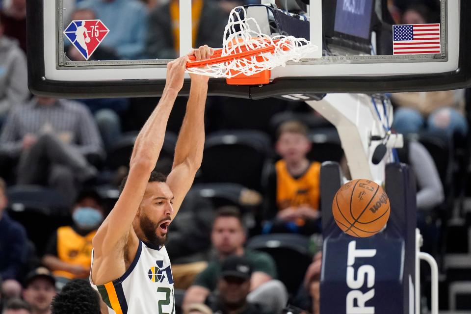 Utah Jazz center Rudy Gobert (27) dunks against the Oklahoma City Thunder during the first half of an NBA basketball game Wednesday, April 6, 2022, in Salt Lake City. (AP Photo/Rick Bowmer)