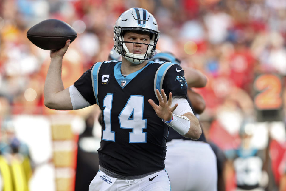 Carolina Panthers quarterback Sam Darnold (14) throws a pass against the Tampa Bay Buccaneers during the first half of an NFL football game Sunday, Jan. 9, 2022, in Tampa, Fla. (AP Photo/Mark LoMoglio)