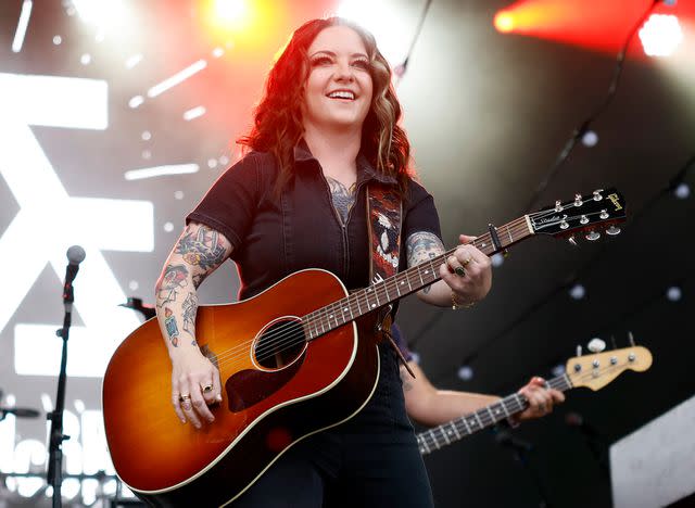 <p>Jason Kempin/Getty</p> Ashley McBryde performs onstage for day two of the 2023 Pilgrimage Music & Cultural Festival on September 24, 2023 in Franklin, Tennessee.