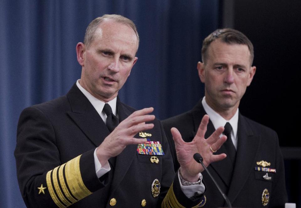 Chief of Naval Operations Adm. Jonathan W. Greenert, left, accompanied by Adm. John M. Richardson, director of the Naval Nuclear Propulsion Program, speaks during a news conference at the Pentagon, Tuesday, Feb. 4, 2014. The Navy is investigating alleged cheating on tests by senior enlisted sailors training on naval nuclear reactors at Charleston, S.C., officials said Tuesday (AP Photo/Manuel Balce Ceneta)