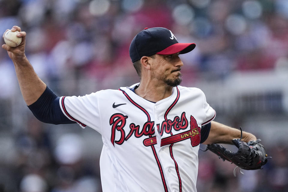 Atlanta Braves starting pitcher Charlie Morton (50) delivers in the first inning of a baseball game against New York Mets, Wednesday, June 7, 2023, in Atlanta. (AP Photo/John Bazemore)