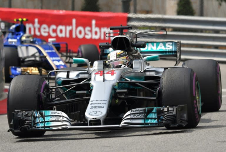 Mercedes driver Lewis Hamilton trailed behind championship rival Sebastian Vettel in practice for the Monaco Grand Prix