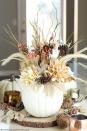 <p>Why put flower arrangements in a plain old vase when you can put them in a faux pumpkin?</p><p><strong>Get the tutorial at <a rel="nofollow noopener" href="http://apumpkinandaprincess.com/2015/09/diy-pumpkin-vase.html?crlt.pid=camp.jk9zJrhT8597" target="_blank" data-ylk="slk:A Pumpkin and A Princess;elm:context_link;itc:0;sec:content-canvas" class="link ">A Pumpkin and A Princess</a>. </strong></p>