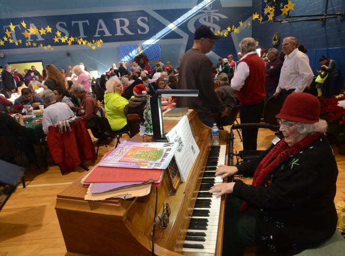 Patrick Sullivan/Times-News
25-December-2013 
People take part in the annual Bounty of Bethlehem Christmas dinner at Immaculate Conception Church Wednesday.