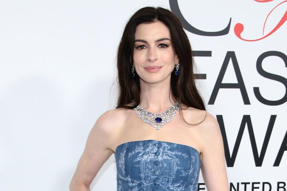 <p>Dimitrios Kambouris/Getty </p> Anne Hathaway at the 2023 CFDA Awards