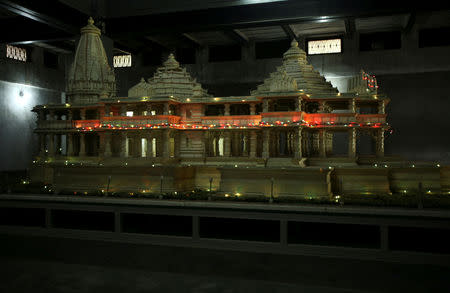 FILE PHOTO: A model of a proposed Ram temple, which Hindus want to build on the site of the demolished Babri Mosque, is pictured in the northern Indian town of Ayodhya September 30, 2010. REUTERS/Mukesh Gupta/File photo