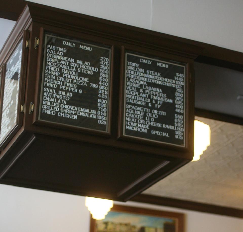 The historic menu board at Angelo's.