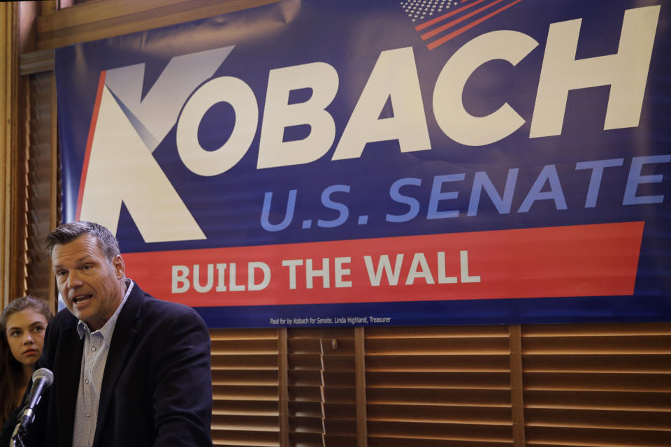 Former Kansas Secretary of State Kris Kobach addresses the crowd as he announces his candidacy for the Republican nomination for the U.S. Senate Monday, July 8, 2019, in Leavenworth, Kan. (AP Photo/Charlie Riedel)